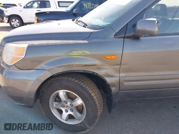 2007 Honda Pilot EX-L with VIN 2HKYF18667H501911, listed as a IAAI auction lot 41752356 with 267,277 mi miles and . Bid and sale history available at DreamBid. Image 6.