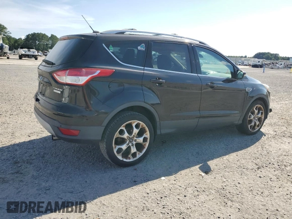 2013 Ford Escape Titanium z VIN 1FMCU0J93DUB60916, wystawiony jako Copart lot #61692595 z przebiegiem 169 691 mil mil oraz Szkoda całkowita • Salvage title. Historia ofert i sprzedaży dostępna na DreamBid. Obrazek 3.