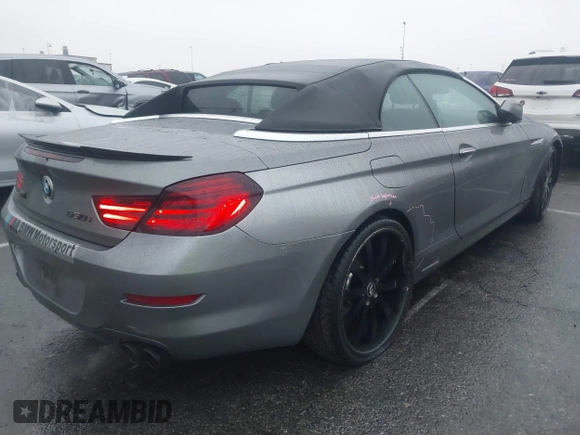 2012 BMW 6 Series 650i with VIN WBALZ3C5XCDL70748, listed as a IAAI auction lot 41502640 with 102,519 mi miles. Bid and sale history available at carsss.com. Image 4.
