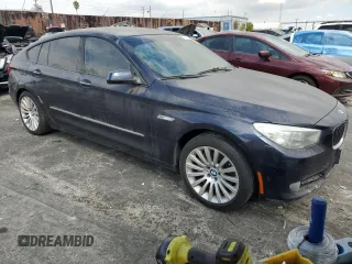 2011 BMW 5 Series GT 535i with VIN WBASN2C53BC201628, listed as a Copart auction lot 72281814 with 125,210 mi miles and Salvage Title. Bid and sale history available at carsss.com. Image 4.