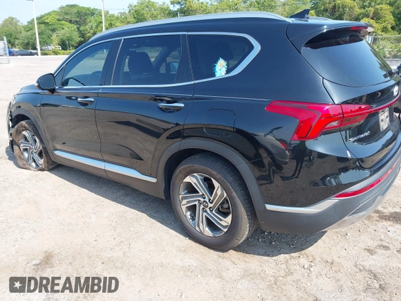 2021 Hyundai Santa Fe SEL z VIN 5NMS64AJ3MH331523, wystawiony jako IAAI lot #42201780 z przebiegiem 84 319 mil mil oraz . Historia ofert i sprzedaży dostępna na DreamBid. Obrazek 3.