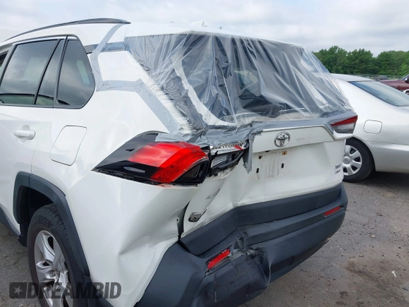 2019 Toyota RAV4 XLE with VIN JTMP1RFV6KD515454, listed as a IAAI auction lot 42618019 with 85,868 mi miles and . Bid and sale history available at DreamBid. Image 6.