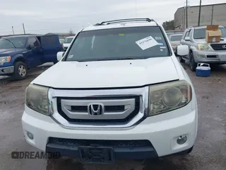 2011 Honda Pilot EX-L with VIN 5FNYF3H67BB014641, listed as a IAAI auction lot 41276698 with 193,656 mi miles and . Bid and sale history available at DreamBid. Image 12.