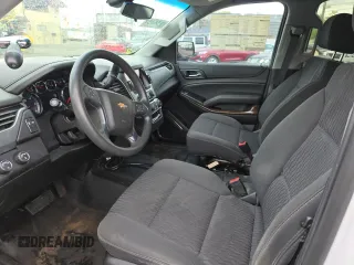 2018 Chevrolet Tahoe Commercial z VIN 1GNSKDEC6JR359306, wystawiony jako Copart lot #57100015 z przebiegiem 154 075 mil mil oraz Czysty tytuł • Clean title. Historia ofert i sprzedaży dostępna na DreamBid. Obrazek 7.