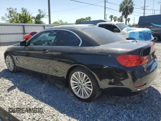 2014 BMW 4 Series 435i with VIN WBA3T3C52EJ877147, listed as a Copart auction lot 53008705 with Not provided miles and Salvage title. Bid and sale history available at DreamBid. Image 2.