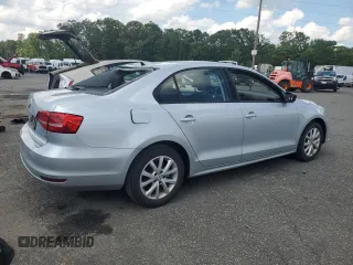 2015 Volkswagen Jetta SE z VIN 3VWD17AJ4FM417218, wystawiony jako Copart lot #61001125 z przebiegiem 84 159 mil mil oraz Szkoda całkowita • Salvage title. Historia ofert i sprzedaży dostępna na DreamBid. Obrazek 3.