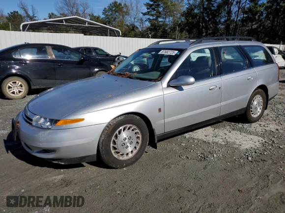2001 Saturn LW z VIN 1G8JW82R71Y507617, wystawiony jako Copart lot #87682725 z przebiegiem 60 499 mil mil oraz Tytuł czysty. Historia ofert i sprzedaży dostępna na DreamBid. Obrazek 1.