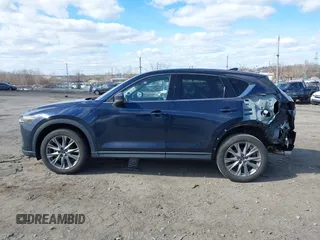 2020 Mazda CX-5 Grand Touring with VIN JM3KFBDM2L0768770, listed as a IAAI auction lot 41695058 with 44,192 mi miles. Bid and sale history available at carsss.com. Image 13.