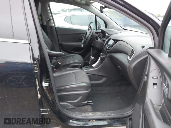 2020 Chevrolet Trax LT with VIN KL7CJLSB2LB015650, listed as a IAAI auction lot 42190979 with 64,018 mi miles and . Bid and sale history available at DreamBid. Image 5.