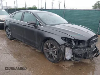 2020 Ford Fusion Titanium with VIN 3FA6P0K97LR192657, listed as a IAAI auction lot 42170258 with 87,696 mi miles and . Bid and sale history available at DreamBid. Image 1.