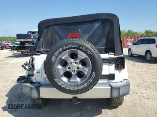 2017 Jeep Wrangler Unlimited Sahara with VIN 1C4BJWEG4HL504429, listed as a Copart auction lot 51370715 with 52,286 mi miles and Salvage Title. Bid and sale history available at carsss.com. Image 6.