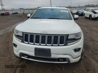 2014 Jeep Grand Cherokee Overland with VIN 1C4RJFCG7EC572298, listed as a Copart auction lot 83970004 with 104,861 mi miles and Salvage Title. Bid and sale history available at DreamBid. Image 5.