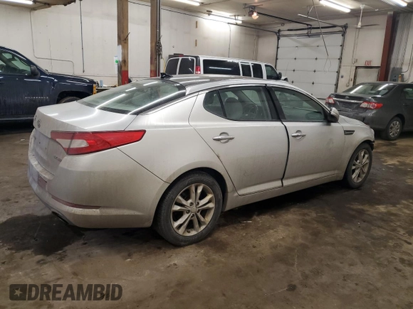 2012 Kia Optima EX with VIN 5XXGN4A67CG061858, listed as a Copart auction lot 43562795 with 168,789 mi miles and Salvage Title. Bid and sale history available at carsss.com. Image 3.