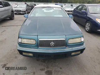 1994 Chrysler LeBaron z VIN 1C3EU4530RF189347, wystawiony jako Copart lot #72474654 z przebiegiem 38 868 mil mil oraz Tytuł czysty. Historia ofert i sprzedaży dostępna na DreamBid. Obrazek 5.