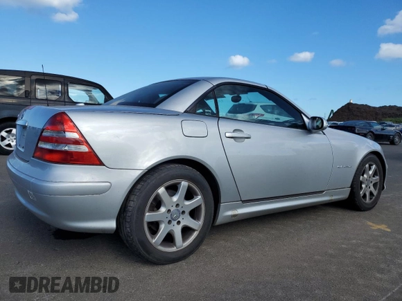 2002 Mercedes-Benz SLK-Class 2.3L Kompressor with VIN WDBKK49FX2F242987, listed as a Copart auction lot 65685554 with 96,461 mi miles and Salvage Title. Bid and sale history available at carsss.com. Image 3.