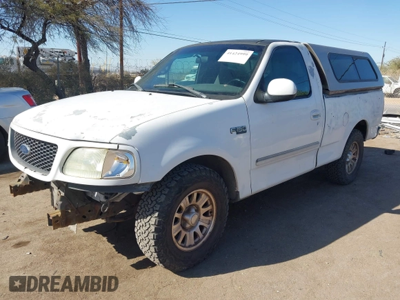 2002 Ford F-150 XL with VIN 1FTRF17282KA85955, listed as a IAAI auction lot 41424999 with 183,700 mi miles and . Bid and sale history available at DreamBid. Image 2.
