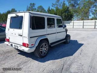 2015 Mercedes-Benz G-Class G 63 AMG with VIN WDCYC7DF0FX231296, listed as a IAAI auction lot 41810368 with 92,158 mi miles. Bid and sale history available at carsss.com. Image 4.
