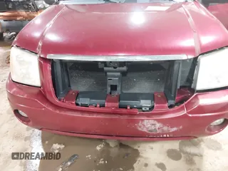 2006 GMC Envoy SLT with VIN 1GKDS13S362135683, listed as a IAAI auction lot 41477501 with 214,760 mi miles. Bid and sale history available at carsss.com. Image 6.