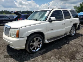 2004 Cadillac Escalade with VIN 1GYEK63N84R119579, listed as a Copart auction lot 60882945 with Not provided miles and Salvage title. Bid and sale history available at DreamBid. Image 1.