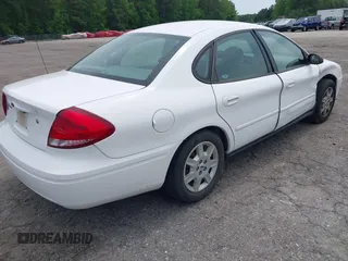 2007 Ford Taurus SE z VIN 1FAFP53U57A101188, wystawiony jako IAAI lot #42102585 z przebiegiem Nie podano mil oraz . Historia ofert i sprzedaży dostępna na DreamBid. Obrazek 4.