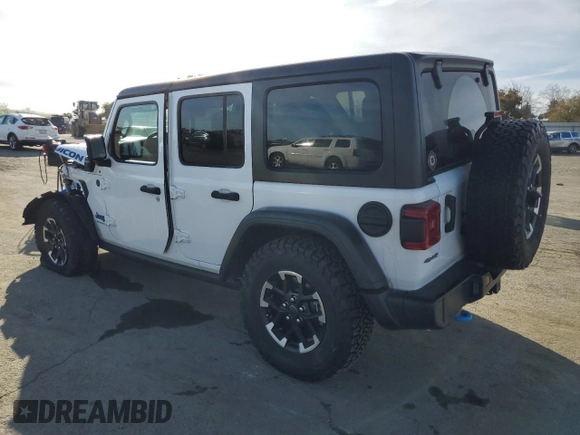 2024 Jeep Wrangler Rubicon with VIN 1C4RJXR6XRW115879, listed as a Copart auction lot 45816825 with 34,557 mi miles and Salvage Title. Bid and sale history available at DreamBid. Image 2.