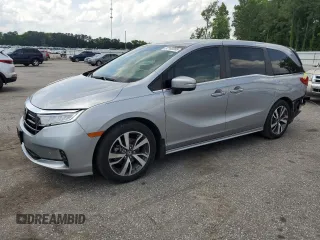 2021 Honda Odyssey Touring with VIN 5FNRL6H85MB039444, listed as a Copart auction lot 57142205 with 74,228 mi miles and Salvage title. Bid and sale history available at DreamBid. Image 1.