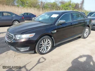 2013 Ford Taurus Limited with VIN 1FAHP2F85DG188511, listed as a IAAI auction lot 42077614 with 165,059 mi miles. Bid and sale history available at carsss.com. Image 2.