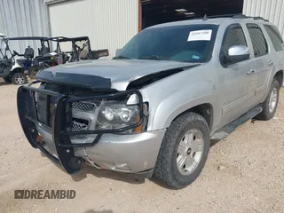 2011 Chevrolet Tahoe LT with VIN 1GNSCBE08BR369781, listed as a IAAI auction lot 42207208 with 162,038 mi miles and . Bid and sale history available at DreamBid. Image 6.