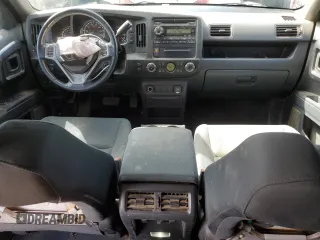 2014 Honda Ridgeline Sport with VIN 5FPYK1F7XEB008758, listed as a Copart auction lot 51022445 with 197,006 mi miles and Salvage title. Bid and sale history available at DreamBid. Image 8.