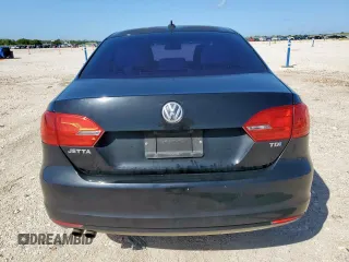 2013 Volkswagen Jetta TDI w/Premium z VIN 3VWLL7AJ7DM232096, wystawiony jako Copart lot #57265725 z przebiegiem 120 361 mil mil oraz Szkoda całkowita • Salvage title. Historia ofert i sprzedaży dostępna na DreamBid. Obrazek 6.