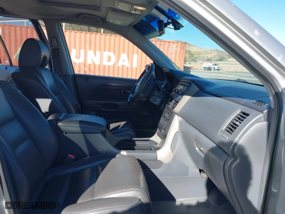 2006 Honda Pilot EX-L with VIN 5FNYF28576B044908, listed as a IAAI auction lot 41396638 with 150,540 mi miles. Bid and sale history available at carsss.com. Image 5.