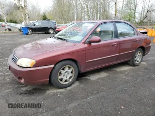 2003 Kia Spectra z VIN KNAFB121835211810, wystawiony jako Copart lot #51289625 z przebiegiem 133 868 mil mil oraz Szkoda całkowita • Salvage title. Historia ofert i sprzedaży dostępna na DreamBid. Obrazek 1.