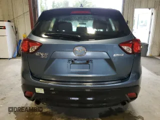 2016 Mazda CX-5 Sport z VIN JM3KE4BY0G0628372, wystawiony jako Copart lot #57534785 z przebiegiem 152 487 mil mil oraz Szkoda całkowita • Salvage title. Historia ofert i sprzedaży dostępna na DreamBid. Obrazek 6.