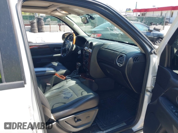 2008 GMC Envoy Denali with VIN 1GKET63M482171059, listed as a IAAI auction lot 42109163 with 173,415 mi miles. Bid and sale history available at carsss.com. Image 5.
