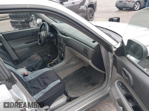 2003 Subaru Forester X with VIN JF1SG63633G728520, listed as a IAAI auction lot 41808658 with 104,084 mi miles. Bid and sale history available at carsss.com. Image 5.