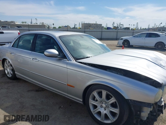 2004 Jaguar XJ 8 with VIN SAJEA71C74SG11470, listed as a IAAI auction lot 42032116 with 209,821 mi miles and . Bid and sale history available at DreamBid. Image 14.