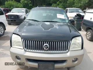 2003 Mercury Mountaineer Convenience z VIN 4M2ZU66W93ZJ43937, wystawiony jako IAAI lot #42303254 z przebiegiem 184 057 mil mil oraz . Historia ofert i sprzedaży dostępna na DreamBid. Obrazek 6.
