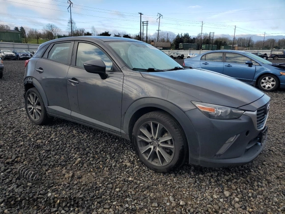 2017 Mazda CX-3 Touring with VIN JM1DKFC74H0176455, listed as a Copart auction lot 48825935 with 90,486 mi miles and Salvage Title. Bid and sale history available at carsss.com. Image 4.