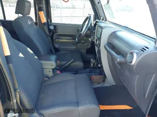 2010 Jeep Wrangler Unlimited Sport with VIN 1J4BA3H17AL219679, listed as a IAAI auction lot 42010714 with 194,172 mi miles. Bid and sale history available at carsss.com. Image 5.