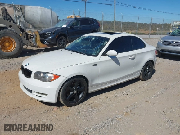 2009 BMW 1 Series 128i with VIN WBAUP73539VK75338, listed as a IAAI auction lot 40643882 with 116,970 mi miles and . Bid and sale history available at carsss.com. Image 2.