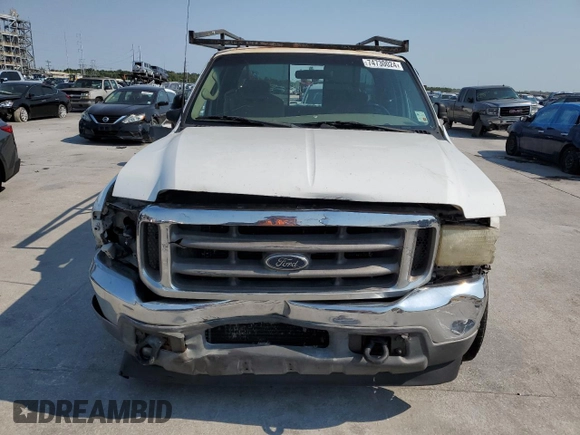 2001 Ford Super Duty F-250 XL with VIN 1FTNX20L01EC17379, listed as a Copart auction lot 74730024 with 309,556 mi miles and Salvage Title. Bid and sale history available at carsss.com. Image 5.