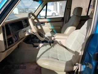 1993 Jeep Cherokee Country with VIN 1J4FJ78S8PL504126, listed as a Copart auction lot 46651035 with 153,170 mi miles and Clean Title. Bid and sale history available at carsss.com. Image 7.