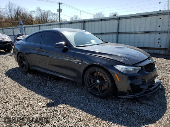 2015 BMW M4 with VIN WBS3R9C53FK329165, listed as a Copart auction lot 48351634 with 135,757 mi miles. Bid and sale history available at carsss.com. Image 4.