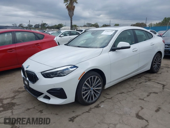 2022 BMW 2 Series 228i with VIN WBA53AK03N7K01287, listed as a IAAI auction lot 41884591 with 16,798 mi miles. Bid and sale history available at carsss.com. Image 2.