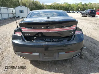 2013 Lincoln MKZ z VIN 3LN6L2GK5DR823755, wystawiony jako Copart lot #53060295 z przebiegiem 145 624 mil mil oraz Szkoda całkowita • Salvage title. Historia ofert i sprzedaży dostępna na DreamBid. Obrazek 6.
