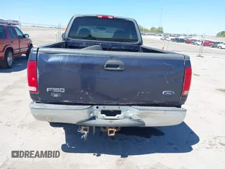 2000 Ford F-150 XL with VIN 1FTRX18LXYNB41132, listed as a IAAI auction lot 42173717 with Not provided miles and . Bid and sale history available at DreamBid. Image 13.