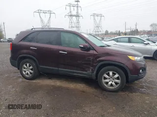 2012 Kia Sorento LX with VIN 5XYKTDA68CG303939, listed as a IAAI auction lot 41917791 with 211,086 mi miles. Bid and sale history available at carsss.com. Image 6.