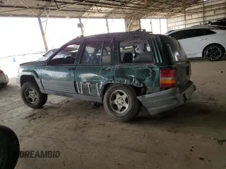 1996 Jeep Grand Cherokee Laredo with VIN 1J4GZ58S6TC304597, listed as a Copart auction lot 52962545 with Not provided miles and Salvage title. Bid and sale history available at DreamBid. Image 2.