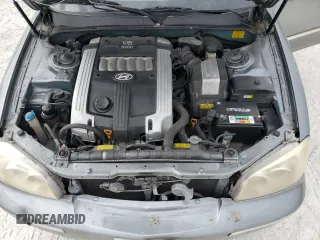2004 Hyundai XG with VIN KMHFU45EX4A279687, listed as a Copart auction lot 88779975 with 133,536 mi miles and Salvage Title. Bid and sale history available at carsss.com. Image 11.