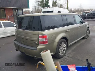 2013 Ford Flex SEL with VIN 2FMHK6C87DBD15704, listed as a IAAI auction lot 41581765 with 152,041 mi miles. Bid and sale history available at carsss.com. Image 4.